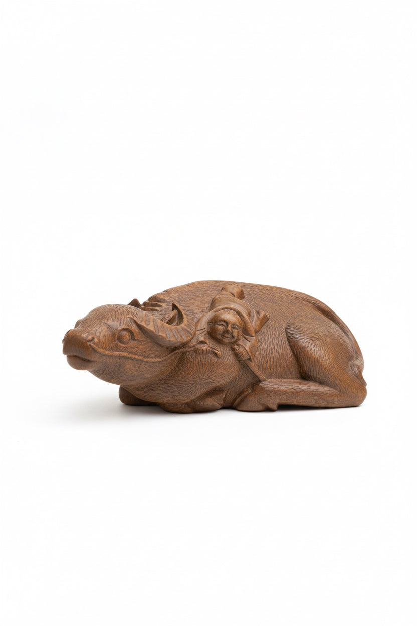 Antique Chinese carved wood sculpture of boy riding water buffalo ox