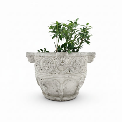 Pair of vintage concrete planters to resemble antique ivory store