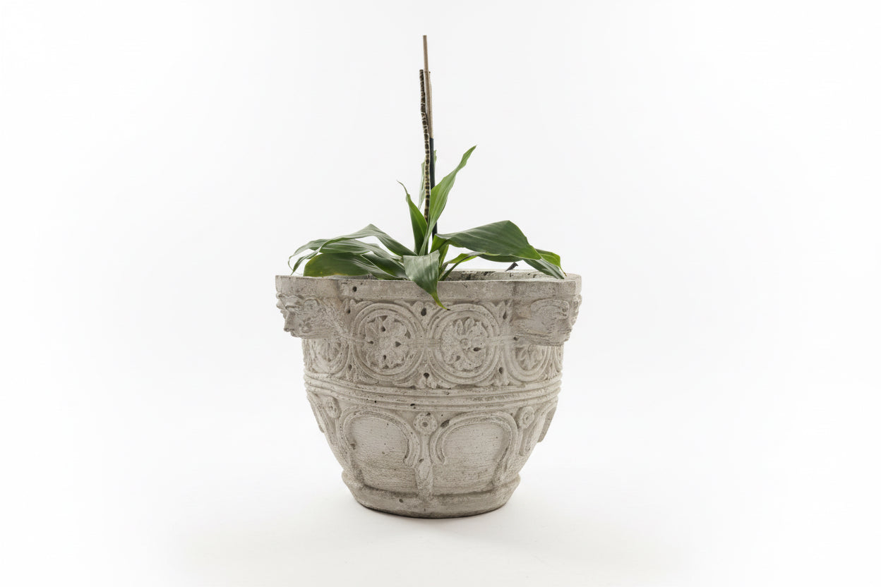 Pair of vintage concrete planters to resemble antique ivory store