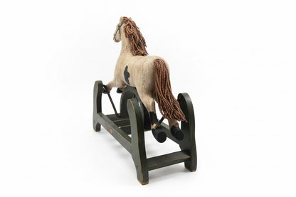 Cheval à bascule artisanal ancien