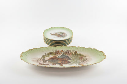 Plat de présentation et 6 assiettes à poisson anciens en porcelaine de Limoges, peints à la main