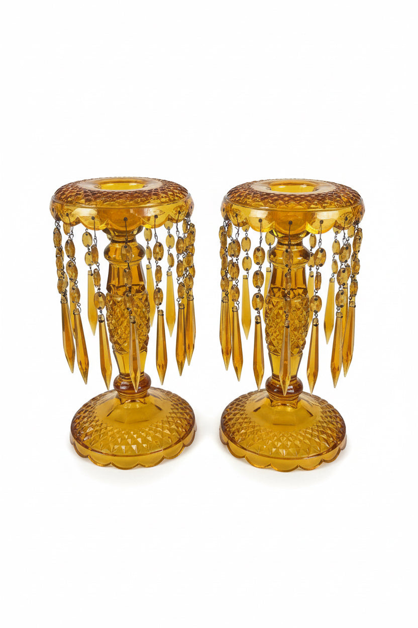 Pair of amber cut Crystal tall candlesticks with drop