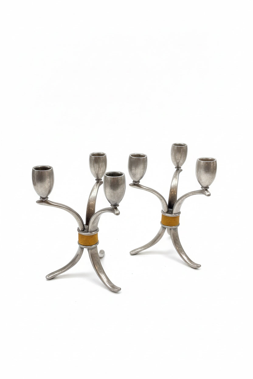 Vintage mid century modern silver plated candle sticks.  Sold as a pair